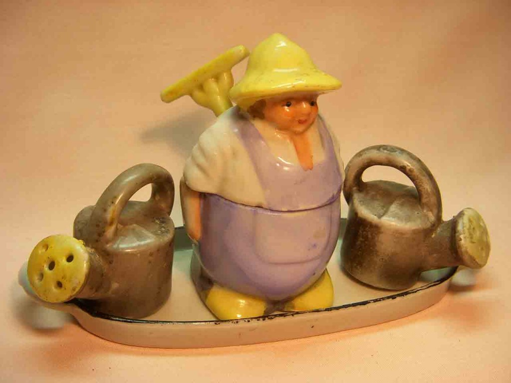 Gardner with watering cans condiment salt and pepper shakers