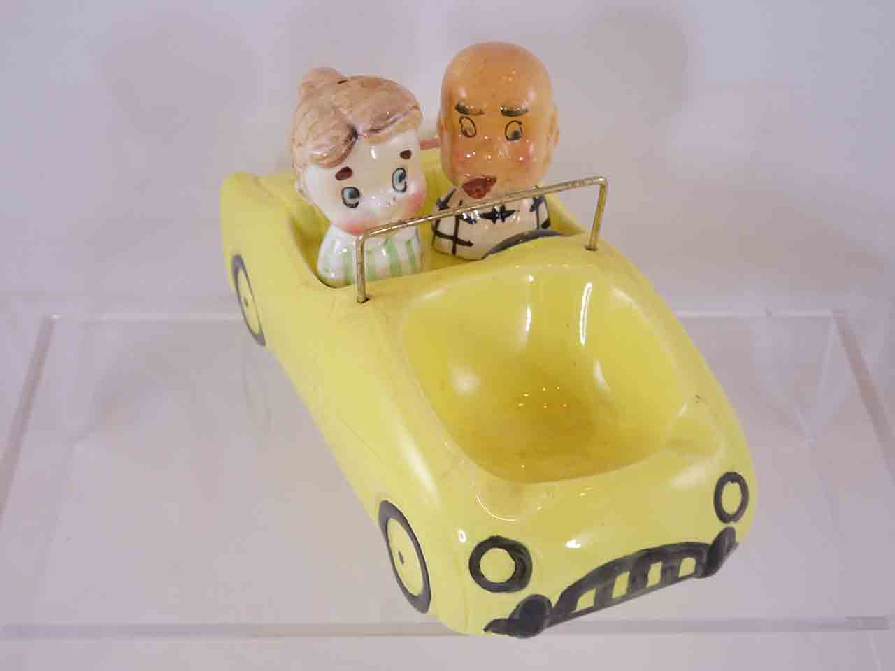 "So It's Your Wedding Anniversary" - old couple in large yellow car salt and pepper shakers