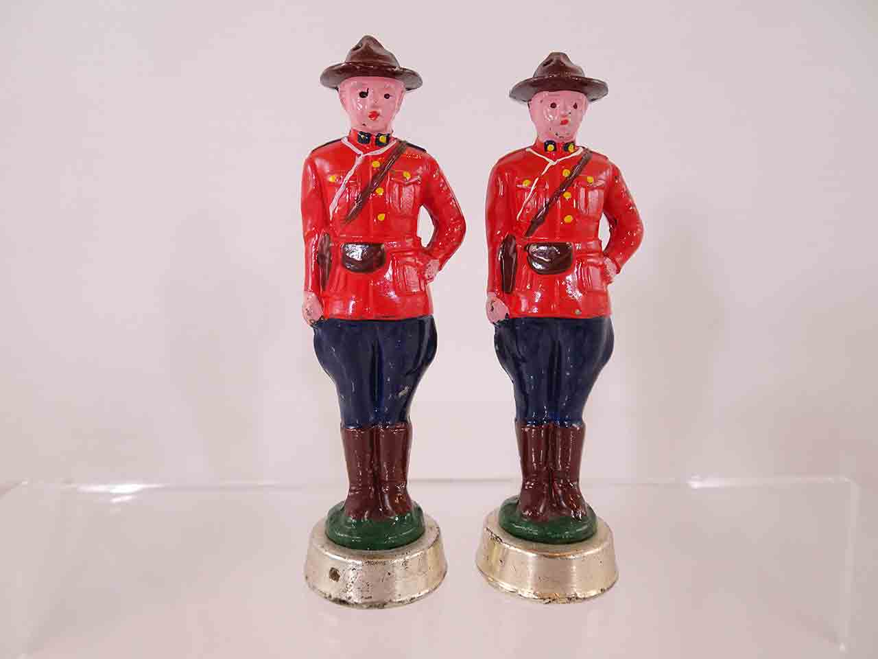 Metal pair of Royal Canadian Mounted Police salt and pepper shakers