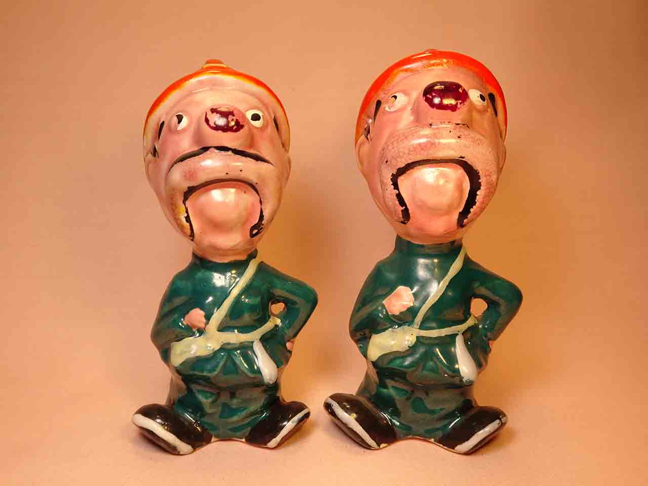 Clown-like strange fellows salt and pepper shakers - firemen