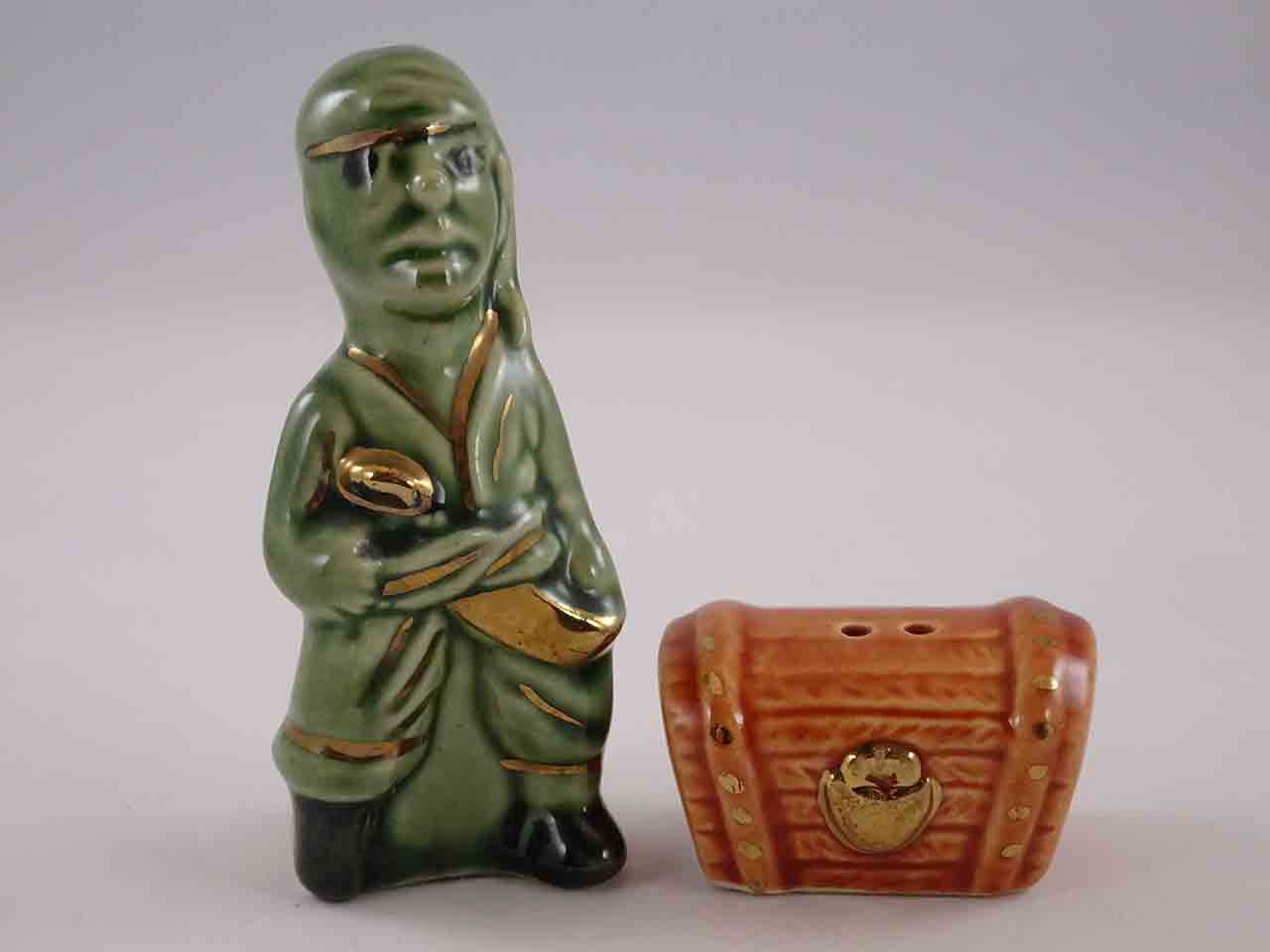 Go with pirate and treasure chest in gold trim salt and pepper shakers