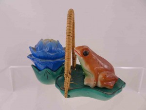 Frog with flower on lily pad with wicker handle salt and pepper shakers